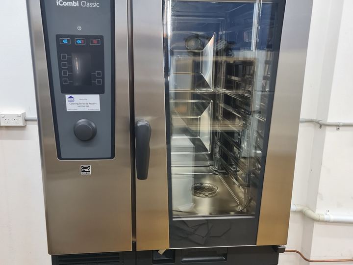 Rational iCombi Classic on stand with hood