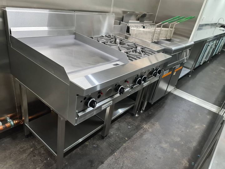 Garland griddle and burners with twin fryers